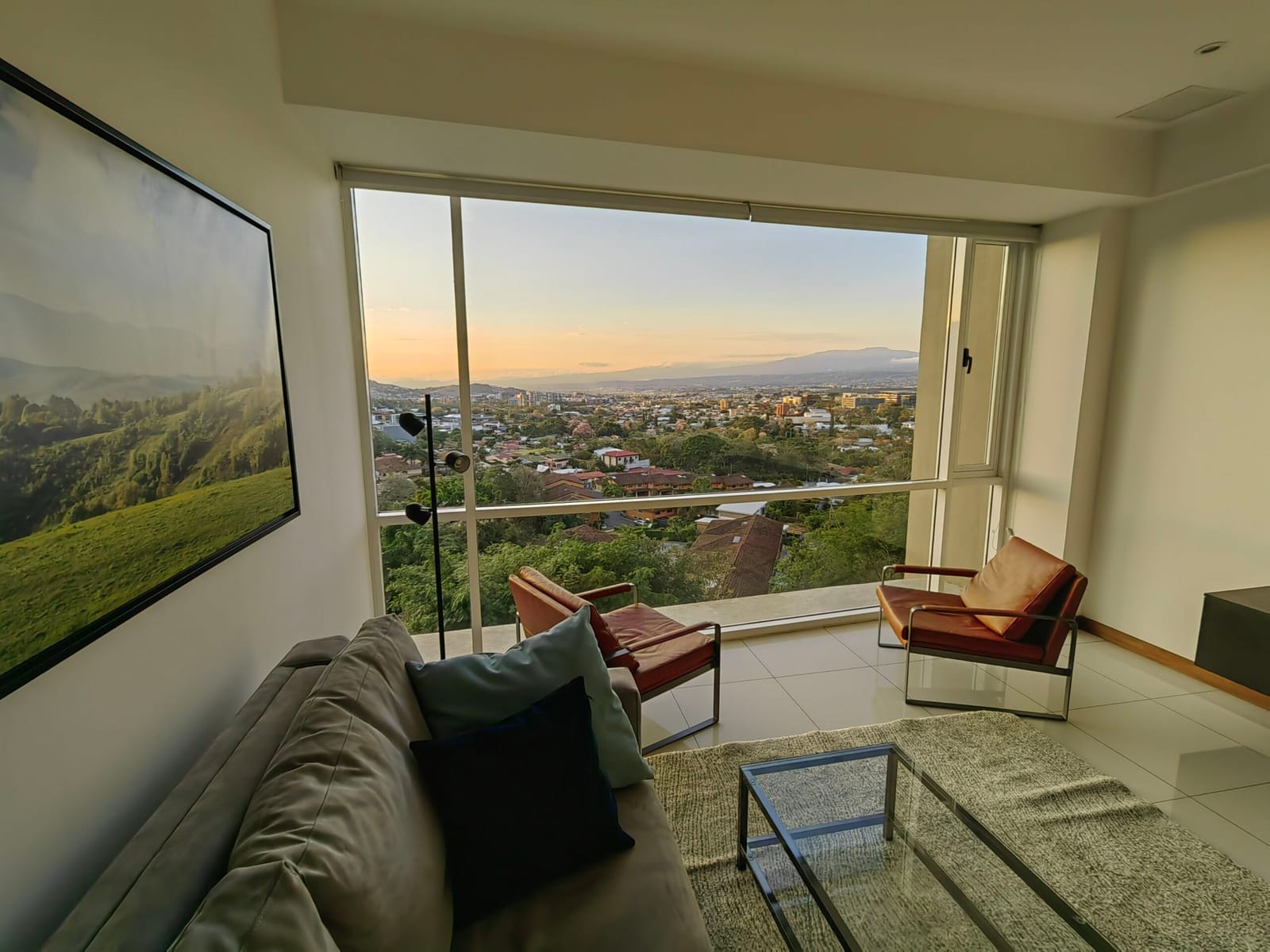 Corner window with evening light over the city