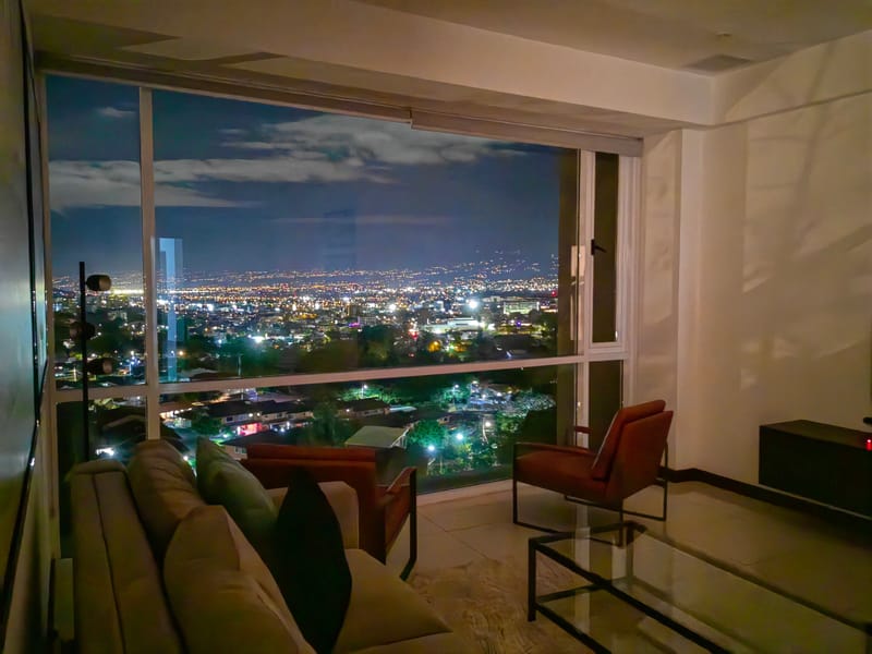 City lights of San José at night from the sofa