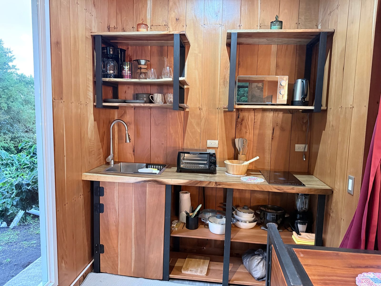 Kitchenette shelves with toaster oven and coffee maker