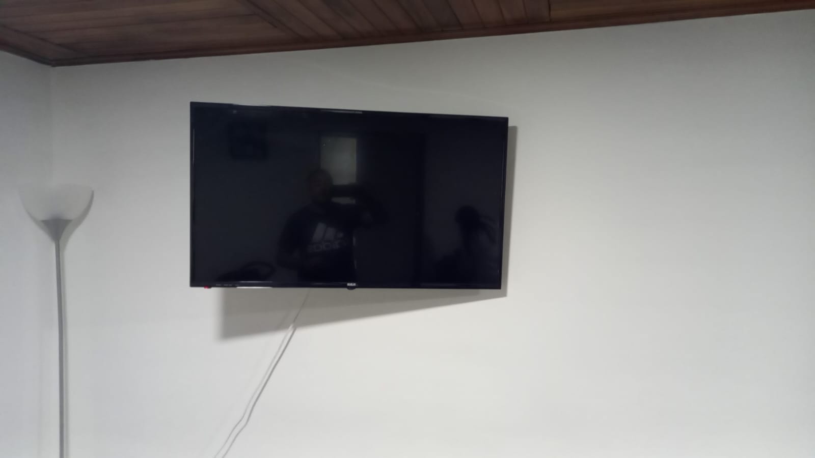 Wall-mounted 48-inch TV set up for streaming apps only