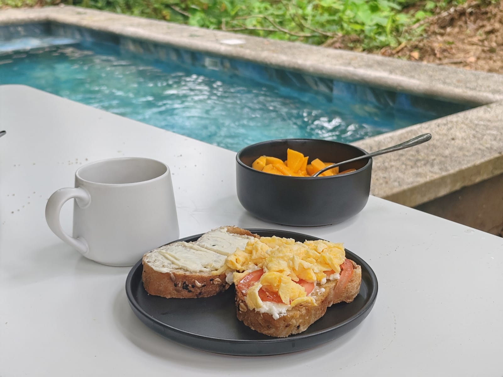 Breakfast and coffee on the edge of the plunge pool