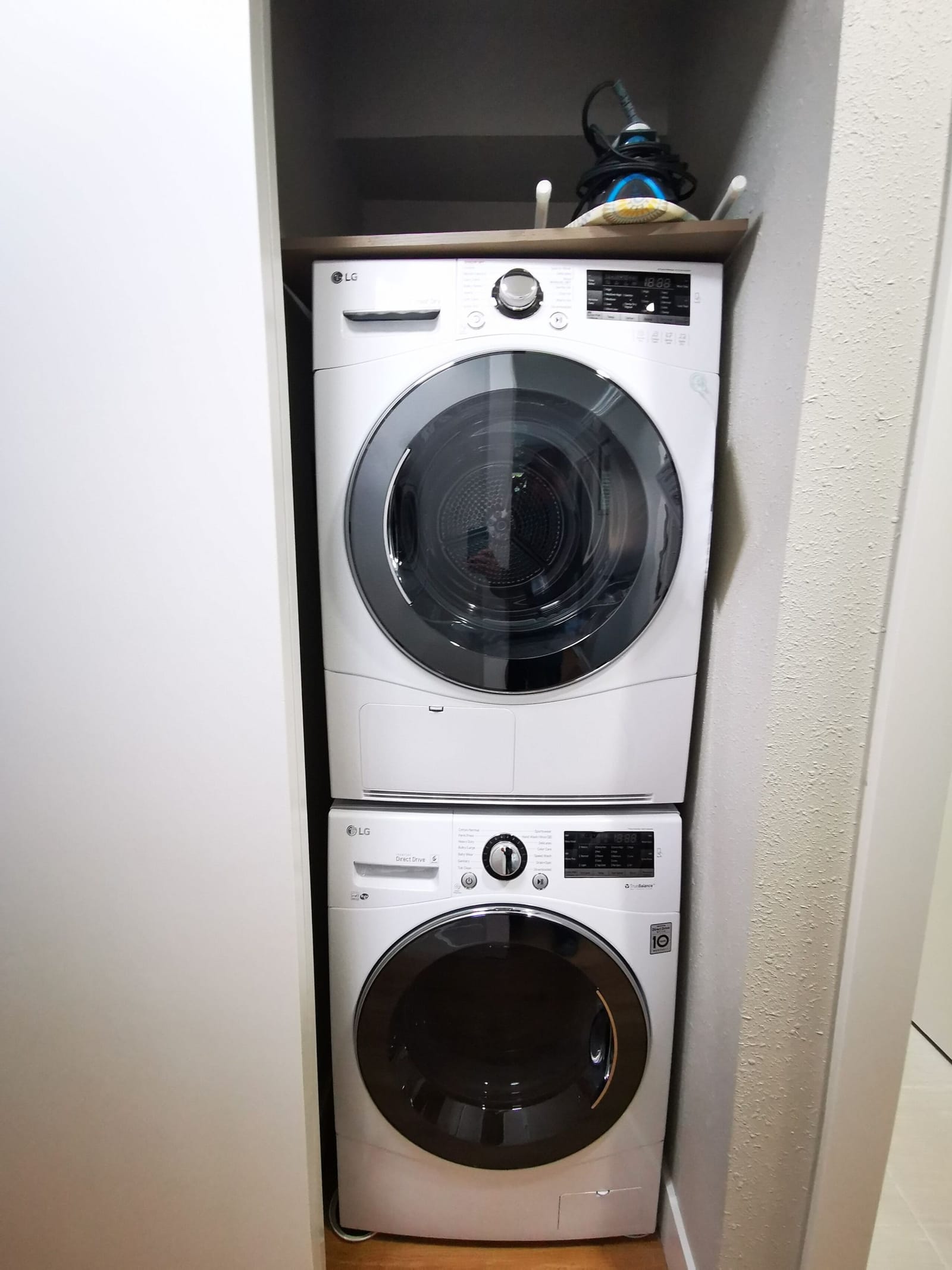 Stacked washer and dryer in the laundry closet