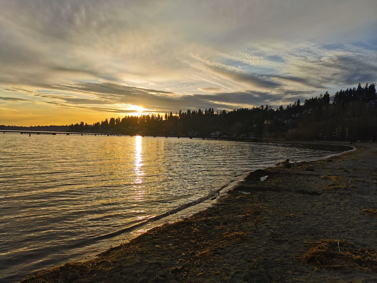 Sunset over Lake Washington from a lakeshore beach near Juanita Beach Home