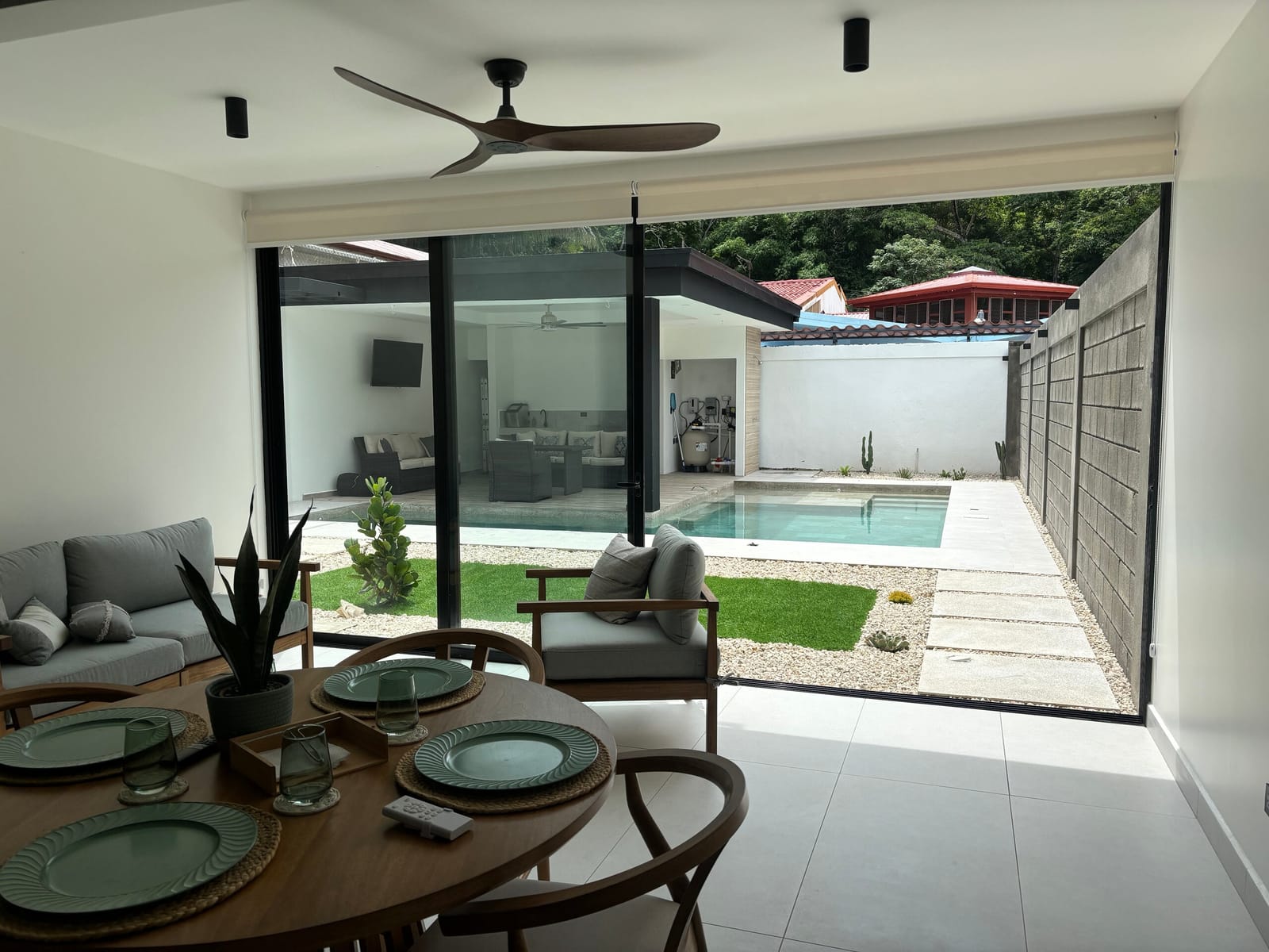 Living area opening onto the terrace and pool