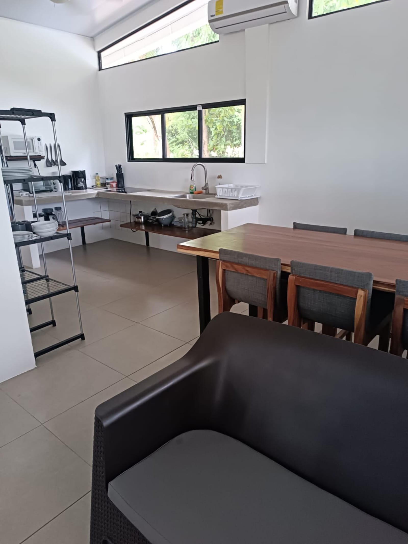 Kitchen counters and shelves seen from the living room